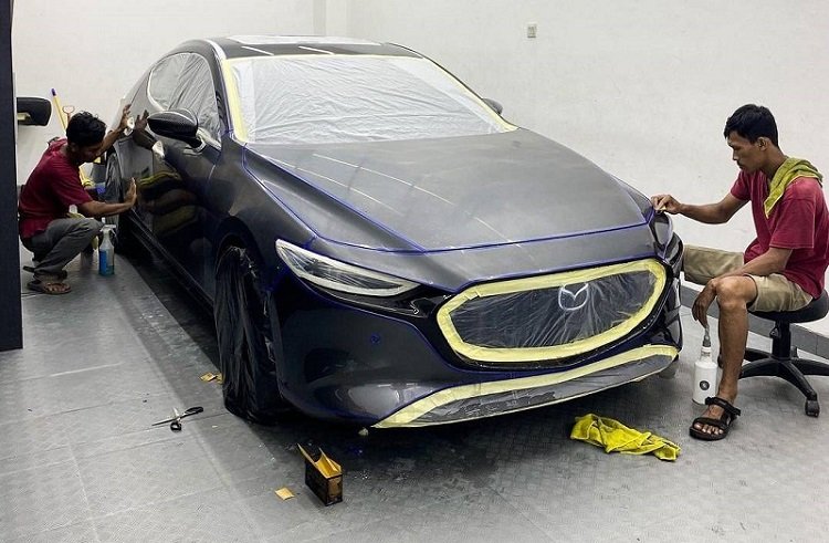Workshop imagery used as editorial context for paint and repaint.